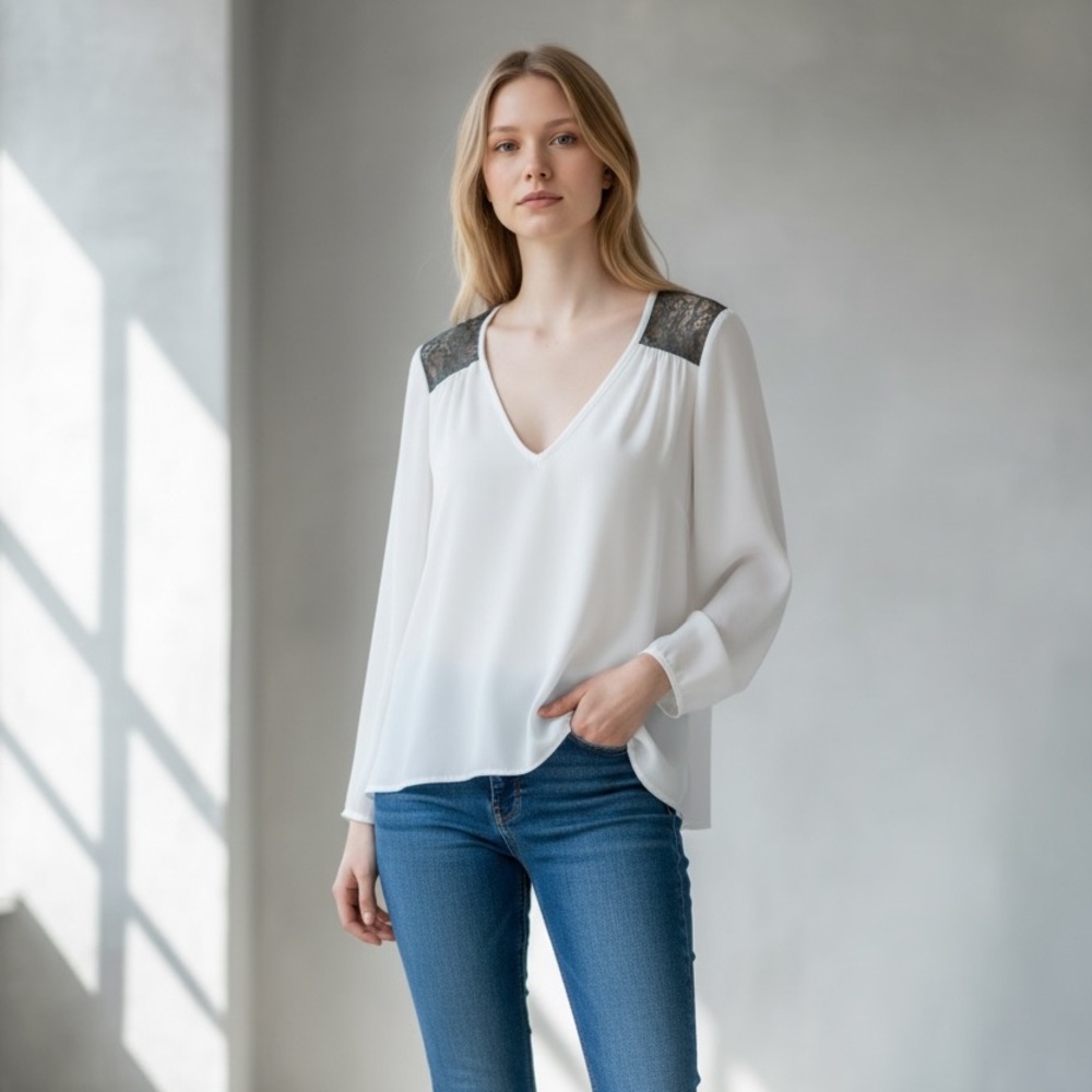 White. Silky and flowy long sleeve